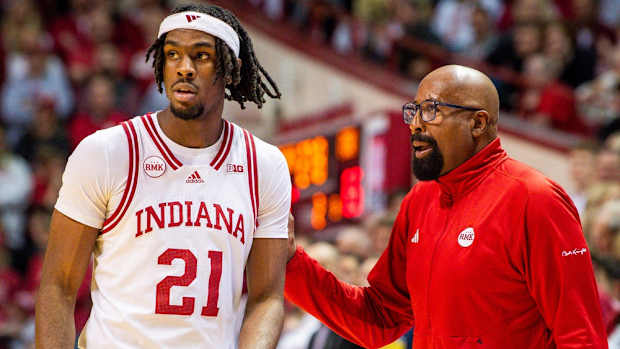 Indiana Head Coach Mike Woodson talks with Mackenzie Mgbako (21) during the second half of the Indiana versus Ohio State men's basketball game at Simon Skjodt Assembly Hall on Saturday, Jan. 6, 2024.